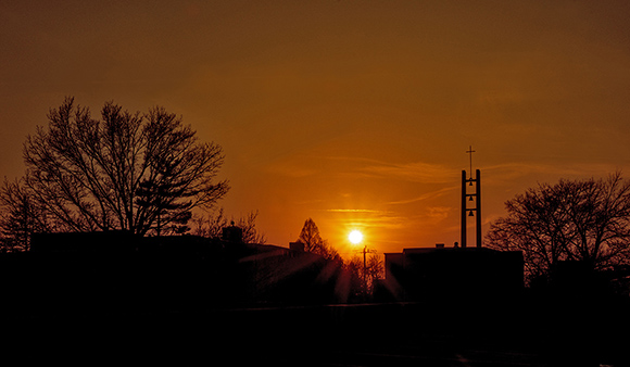 Sun setting over Mater Dei Chapel