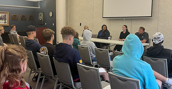 Mount St. Joseph University alumni panel talking to students seated in rows