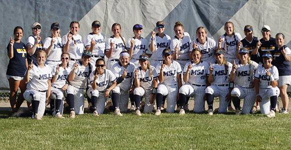 Mount St. Joseph University softball champions smiling.