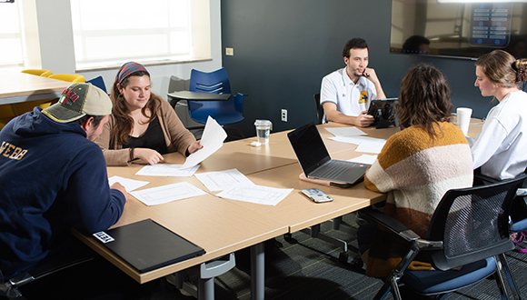 cite students at table