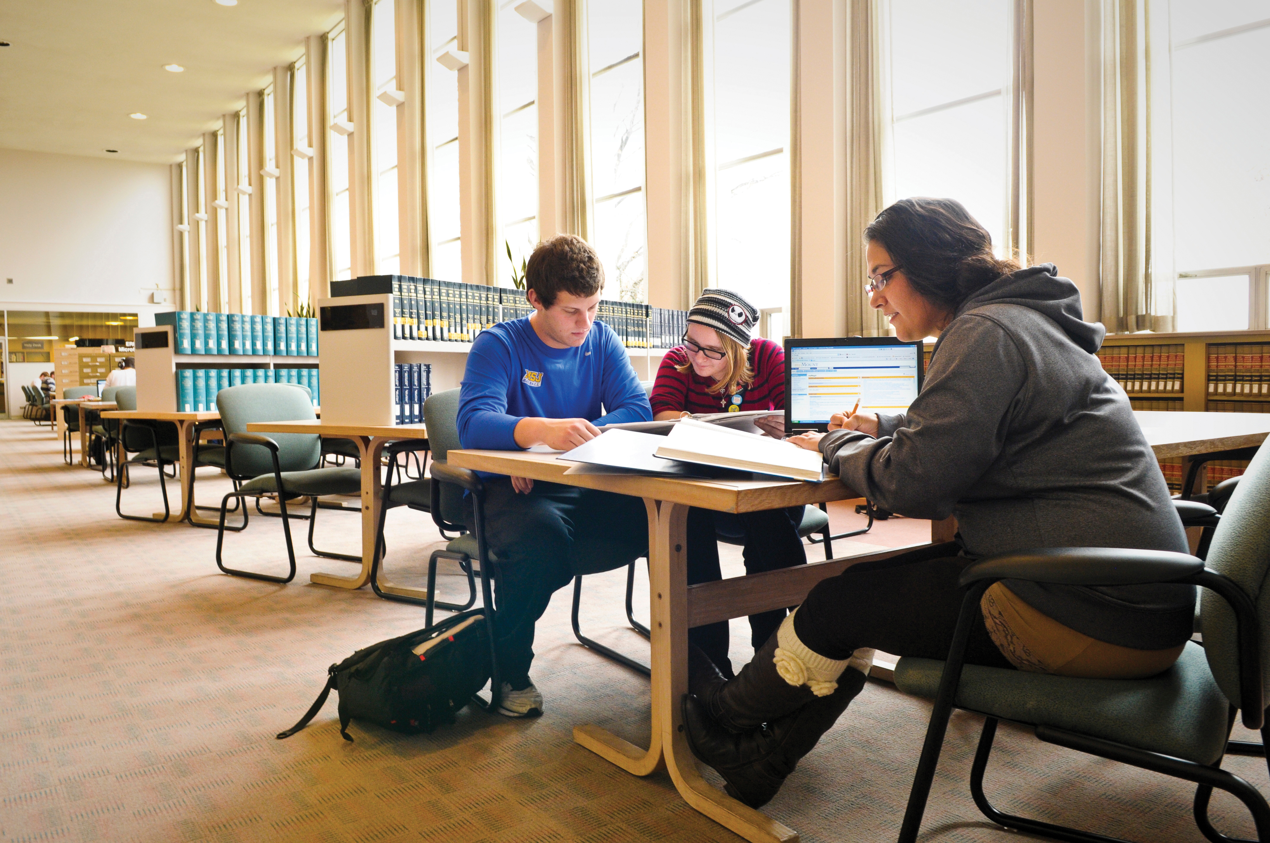 students sitting in library